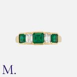 An Emerald and Diamond Five Stone Ring in 18 carat yellow gold, set with three square cut emeralds