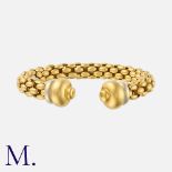 FOPE, A 'Novecento' Mesh Bangle in 18 carat yellow gold, of sprung design. Signed FOPE, Marked 750