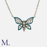 A Diamond and Enamel Butterfly Pendant in 9 carat gold, comprising a blue enamel butterfly set