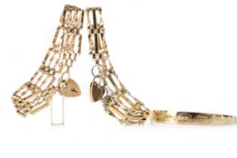 TWO GOLD GATE BRACELETS AND A GOLD PLATED BANGLE