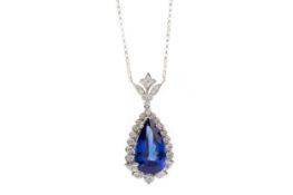 CERTIFICATED TANZANITE AND DIAMOND PENDANT,