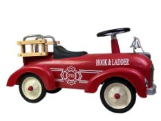 AMERICAN HOOK AND LADDER SIT ON FIRE ENGINE,
