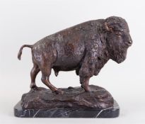 A patinated bronze bison on a marble base. 33 x 38 x 19 cm.