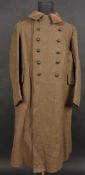 Capote 1920 11eme zouaves. En drap kaki se fermant par deux rangees de six boutons kaki en