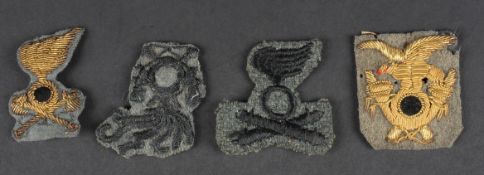 Insignes de calot de l'armee royale. Quatre modele differents d'insignes tissu. A noter une certaine