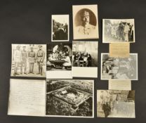 Lot de dix photographies diverses comprenant une carte photo du marechal signant un document sur
