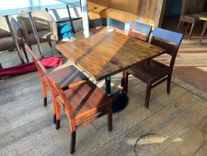 Brown Wooden Table With Metal Base And Four Wooden Chairs