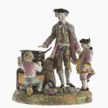 Porzellangruppe mit Maroni-Verkäufer und zwei Putten - unbekannte Manufaktur 19./20. Jh.