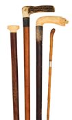 FOUR WALKING CANES, 19TH CENTURY
