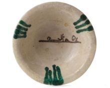 AN ABBASID TIN GLAZED POTTERY BOWL, MESOPOTAMIA, 9TH CENTURY