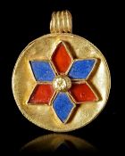 A CIRCULAR GOLD PENDANT PHOENICIAN, 5TH TO 4TH CENTURY BC