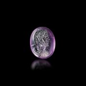 A ROMAN AMETHYST INTAGLIO PORTRAIT OF A NOBLEMAN – REPUBLICAN PERIOD, EARLY 1ST CENTURY A.D.