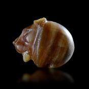 A BEAUTIFUL STAMP SEAL IN THE FORM OF A LION'S HEAD, 3RD MILLENNIUM BC