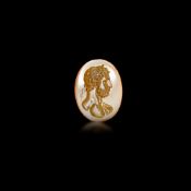 A RADIANT ORANGE AGATE ROMAN INTAGLIO OF EMPEROR HADRIAN – 1ST TO 2ND CENTURY A.D.
