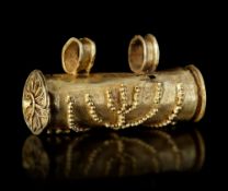 A LATE ROMAN/EARLY BYZANTINE SCROLL/AMULET CASE IN ELECTRUM WITH A MENORAH, 5TH/6TH CENTURY AD