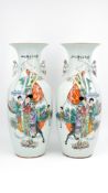 A Chinese pair of Qianjiang and Famille rose decorated porcelain vases, family scene with the dragon