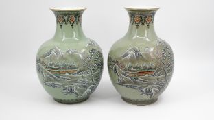 A lot of two matching Chinese Republic decorated porcelain vases with winter landscape decor