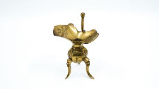 A Chinese polished and decorated bronze tripod vessel