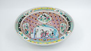 A Chinese Famille rose decorated porcelain punch bowl