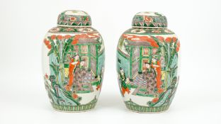 A Chinese pair of Famille verte glazed porcelain covered ginger vases with figurative scenes