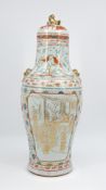 A large Chinese covered porcelain vase with figurative gilt decorated temple scene