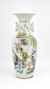 A Chinese Qianjiang and Famille rose decorated porcelain vase with a decor of a fishermen scene