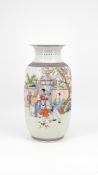 A Chinese Republic Famille rose finely decorated porcelain vase with a family scene in the garden