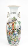 A Chinese two-sided finely decorated Famille rose porcelain vase with figural palace scene