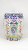 A finely decorated Chinese Famille rose glazed porcelain garden seat with symbolic valuables decor