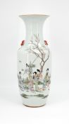 A Chinese Qianjiang cai decorated porcelain vase with ladies in a garden scene decor
