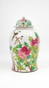 A Chinese Qianjiang and Famille rose decorated and covered porcelain vase