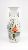 A Chinese Qianjiang and Famille rose decorated porcelain vase with a family scene and dragon