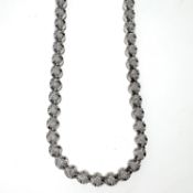 White gold and diamond set collar necklace. Set with multiple diamonds in four claw settings, 18ct