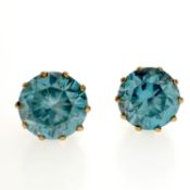 Blue zircon earrings. Each set with a brilliant-cut zircon, mounted in 9ct gold, stamped 9ct,