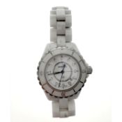 Chanel J12 Watch. A lady’s J12 automatic wristwatch, with white ceramic case, uni-directional bezel,