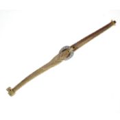 Gubelin diamond bracelet/watch, mid century. Of buckle design, the brilliant-cut diamond buckle