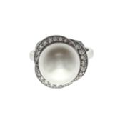 Cultured pearl and diamond ring, 2009. The 12.4mm cultured pearl within an undulating surround set