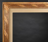 20th Century European School. A Gilt Composition Frame, with a painted slip, rebate 51