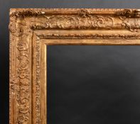 19th Century French School. A Louis Style Gilt Composition Frame, with swept centres and corners,