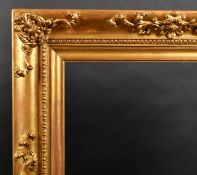 Early 19th Century English School. A Gilt Composition Frame, with swept centres and corners,