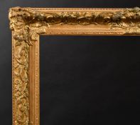 20th Century English School. A Gilt Composition Frame, with swept centres and corners, rebate 30