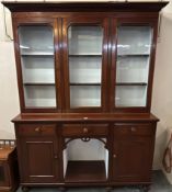 Early 20th century Welsh oak cabinet backed dog kennel dresser, with three glazed drawers