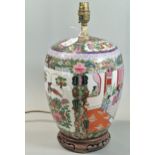 A Chinese design Famille Rose style baluster table lamp on hardwood stand depicting exotic birds