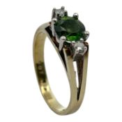Ring 3,41g 585/- Gelbgold und Weißgold mit 2 Diamanten zus. ca. 0,08 ct. und Peridot, Ringgröße c...