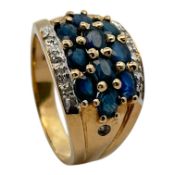 Ring 5,2g 585/- Gelbgold und Weißgold mit 8 Diamanten zus. ca. 0,08 ct. und Saphiren, Ringgröße c...