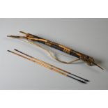 A vintage African tribal Bow and quiver of arrows.