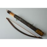 A Tribal African Bow and arrows, with quiver.