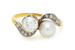 Bague Toi&Moi fin XIXe s., 2 ors 750 sertie d'un diamant taille ancienne et d'une perle blanche (non