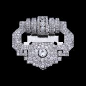 Cartier, clip Art Déco platine et or gris 750 ajourés entièrement pavé de diamants taille ancienne d