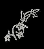 Van Cleef & Arpels, Tuilerie, broche or gris 750 à décor végétal ajouré pavée de diamants taille bri